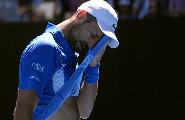 Novak Djokovic retires injured from Australian Open semifinal, as some fans boo