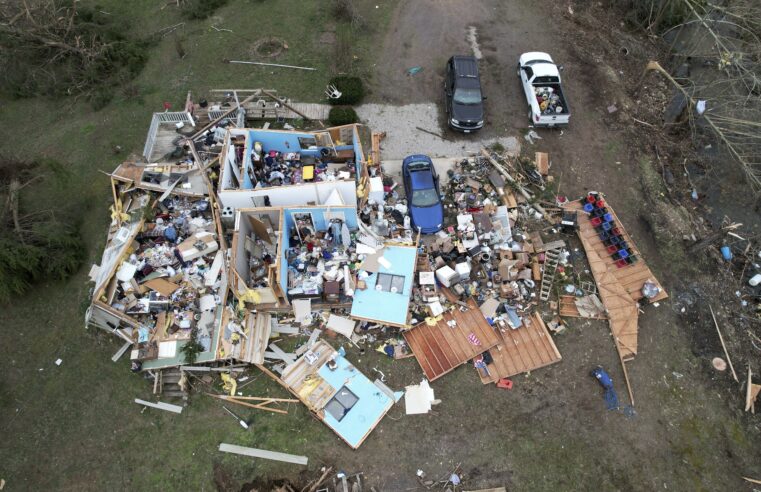 Residents survey the aftermath of deadly weekend storms across the southern U.S.